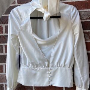 Jennifer Lopez Elegant White Blouse with Button Details